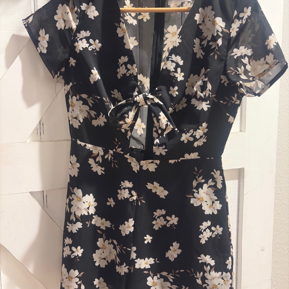Tie Front Romper with Plunge Neckline Peek A Boo Chest Line
